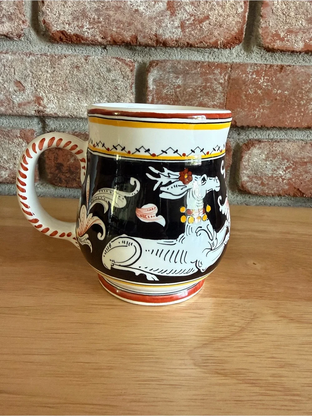Sienna Italy Hand-Painted Ceramic Mug. Featuring white deer small chip